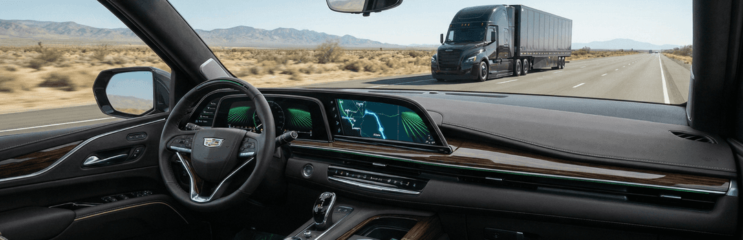 Driver's view from a car interior following a semi truck down a straight desert highway